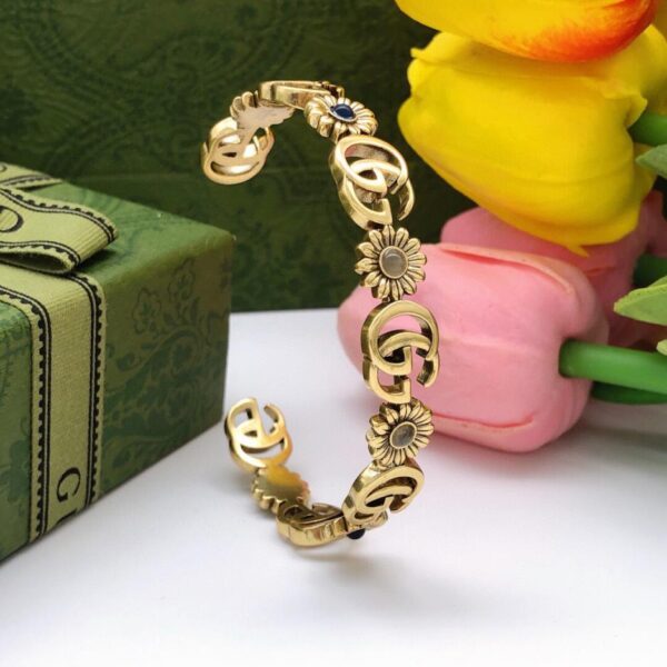 replica,repliche,fake,1:1,earrings,bracelet,ring,jewelry Bracciale Gucci nuovo bracciale girasole GG 209D)