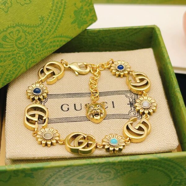 replica,repliche,fake,1:1,earrings,bracelet,ring,jewelry Gucci nuovo bracciale a forma di girasole (118B)