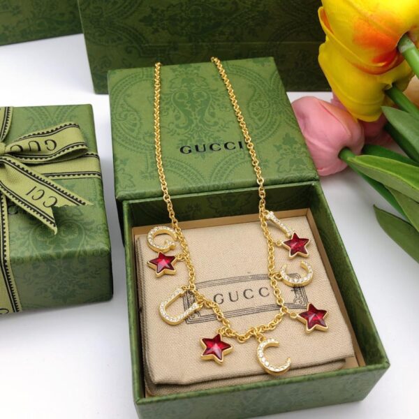 replica,repliche,fake,1:1,earrings,bracelet,ring,jewelry Gucci nuova collana stella doppia G (385B)