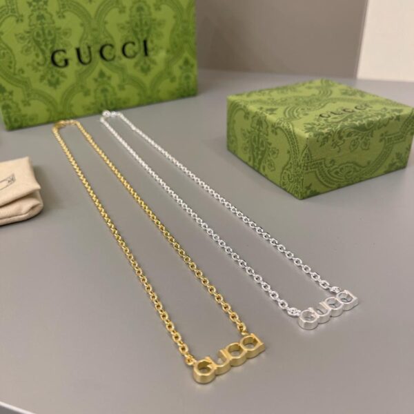 replica,repliche,fake,1:1,earrings,bracelet,ring,jewelry Collana con pendente Gucci nuovo stile con logo scritto a mano (2F43)