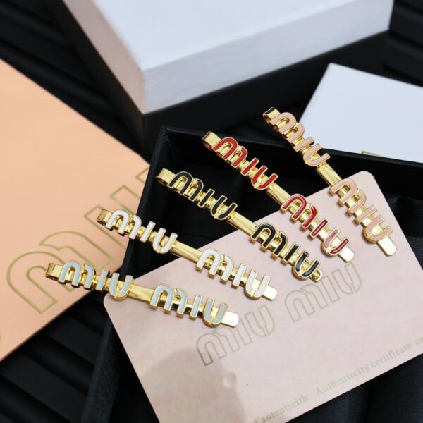 replica,repliche,fake,1:1,earrings,bracelet,ring,jewelry Forcina per capelli smaltata color caramello miumiu (F342)