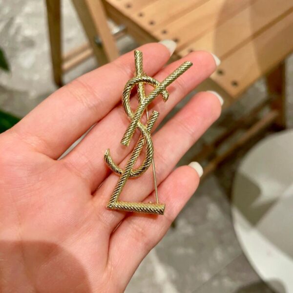 replica,repliche,fake,1:1,earrings,bracelet,ring,jewelry Yves Saint Laurent contatore nuova spilla sincronizzata (4CB0)