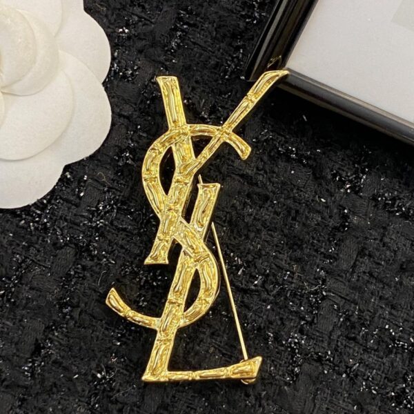 replica,repliche,fake,1:1,earrings,bracelet,ring,jewelry Spilla Yves Saint Laurent (7BB2)