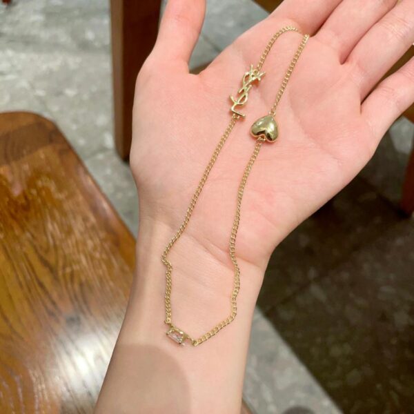 replica,repliche,fake,1:1,earrings,bracelet,ring,jewelry Nuova collana Yves Saint Laurent (197 sec.)