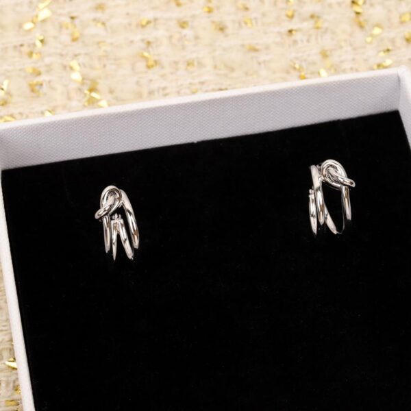 replica,repliche,fake,1:1,earrings,bracelet,ring,jewelry Orecchini tridimensionali annodati di Celine