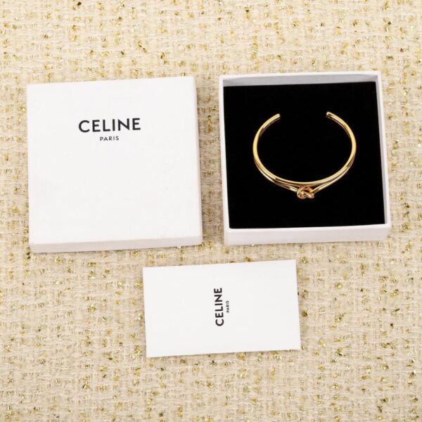 replica,repliche,fake,1:1,earrings,bracelet,ring,jewelry Bracciale annodato aperto tridimensionale di Celine
