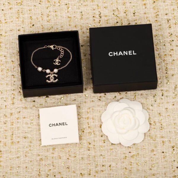 Bracciale Chanel in pizzo nero bianco con perle