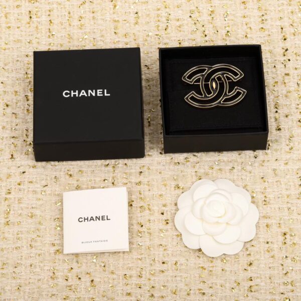 replica,repliche,fake,1:1,earrings,bracelet,ring,jewelry Spilla gocciolante a fumetti di Chanel