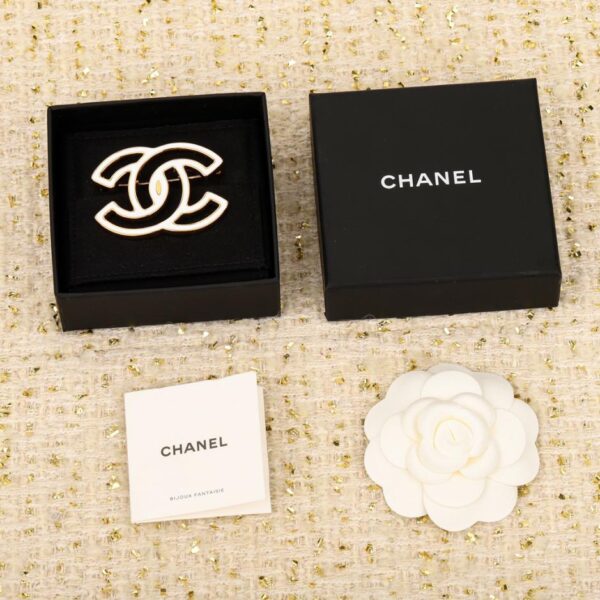 replica,repliche,fake,1:1,earrings,bracelet,ring,jewelry Spilla gocciolante a fumetti di Chanel