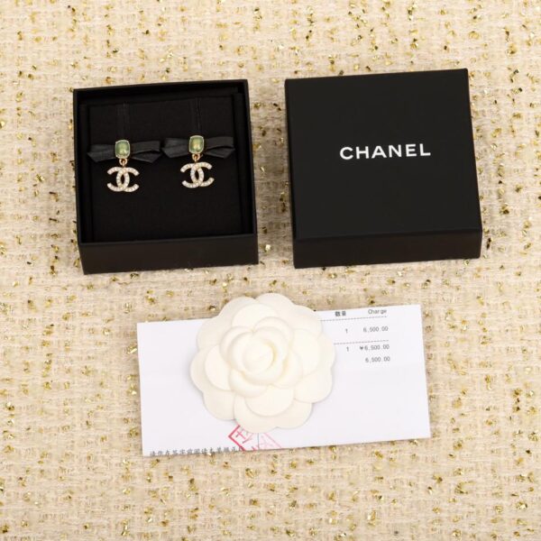 Orecchini a bottone in pelle con fiocco Chanel