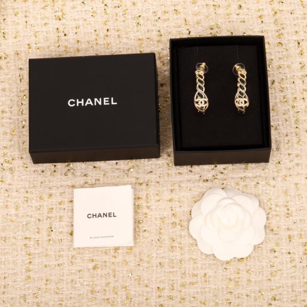 Orecchini a bottone rotondi Chanel doppia c in pelle