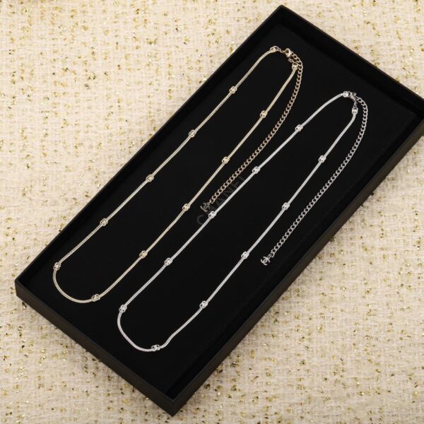 replica,repliche,fake,1:1,earrings,bracelet,ring,jewelry Catena in vita Chanel con osso di serpente a 10 fiori