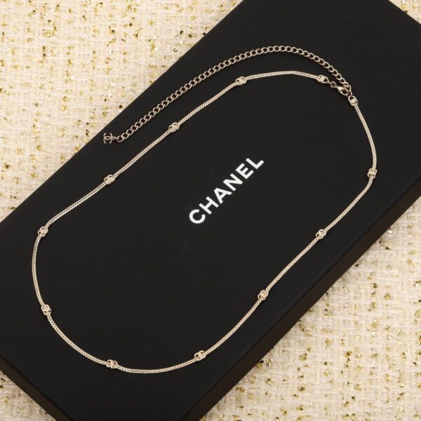 replica,repliche,fake,1:1,earrings,bracelet,ring,jewelry Catena in vita Chanel con osso di serpente a 10 fiori