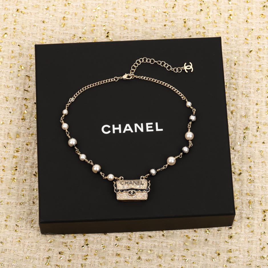 replica,repliche,fake,1:1,earrings,bracelet,ring,jewelry Collana Chanel con borsa in pizzo nero replica,repliche,fake,1:1,earrings,bracelet,ring,jewelry Collana Chanel con borsa in pizzo nero