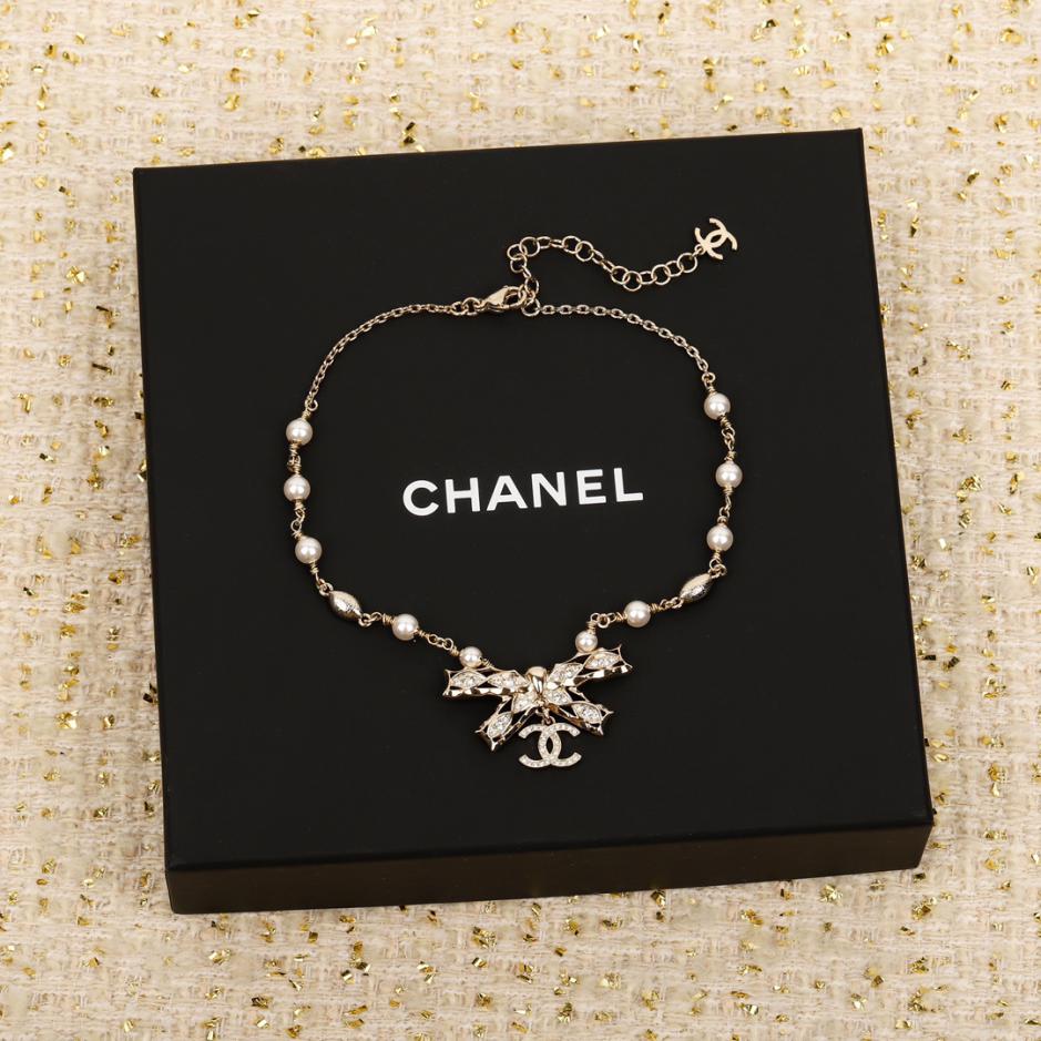 replica,repliche,fake,1:1,earrings,bracelet,ring,jewelry Collana di perle girocollo con fiocco Chanel replica,repliche,fake,1:1,earrings,bracelet,ring,jewelry Collana di perle girocollo con fiocco Chanel