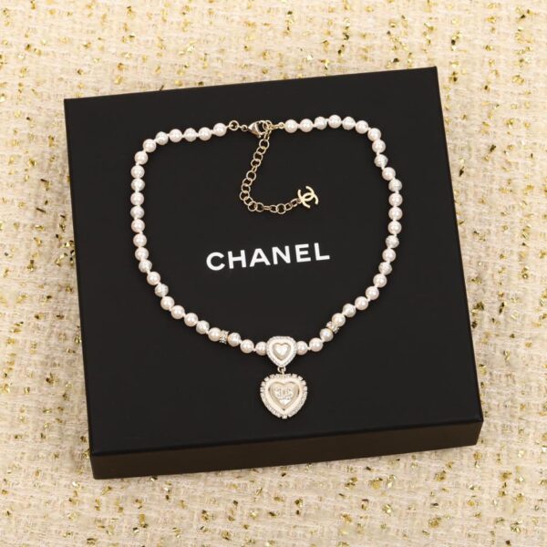 replica,repliche,fake,1:1,earrings,bracelet,ring,jewelry Collana Chanel Love con perle e diamanti