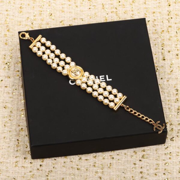 replica,repliche,fake,1:1,earrings,bracelet,ring,jewelry Bracciale Chanel con perle a doppia C