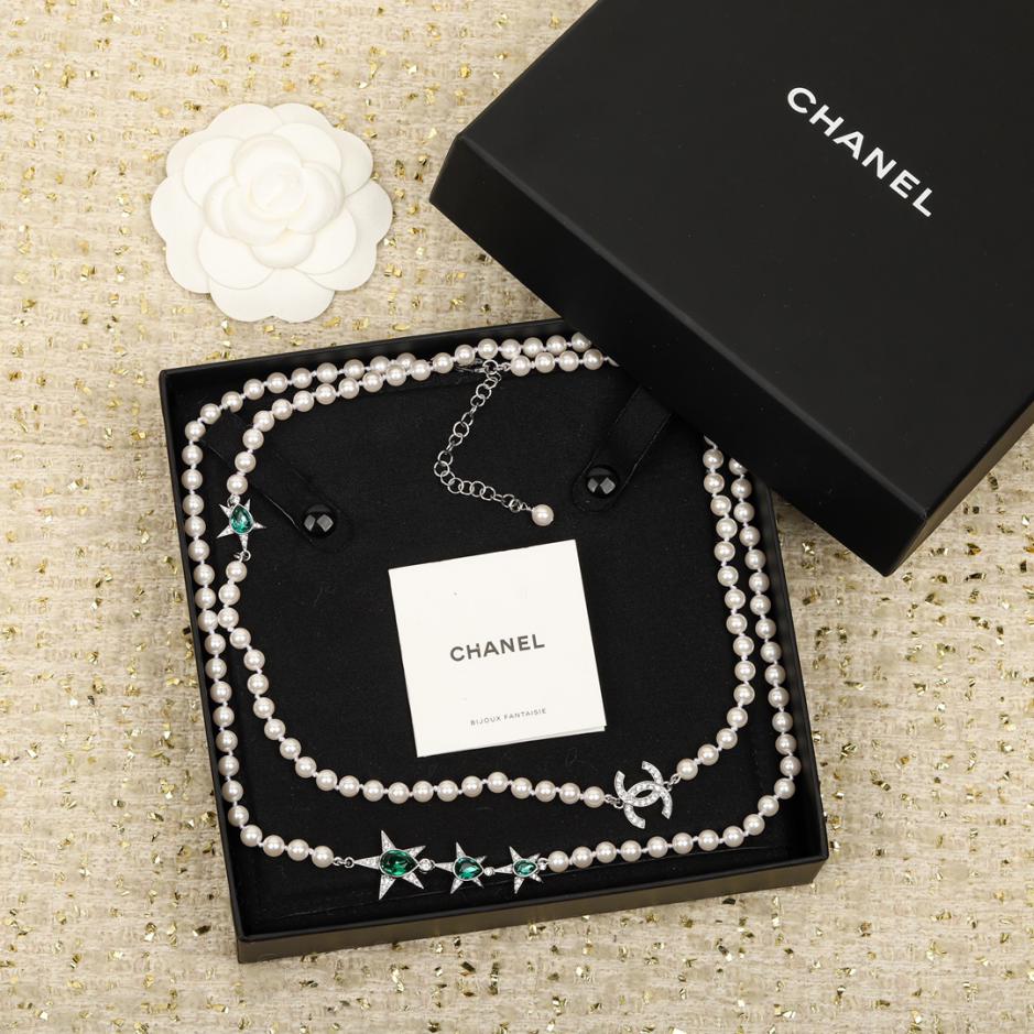 replica,repliche,fake,1:1,earrings,bracelet,ring,jewelry Maglione Chanel con catena di perle e stella a cinque punte replica,repliche,fake,1:1,earrings,bracelet,ring,jewelry Maglione Chanel con catena di perle e stella a cinque punte