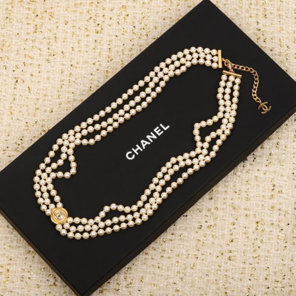 replica,repliche,fake,1:1,earrings,bracelet,ring,jewelry Catena in vita con perle a doppia C con bottone Chanel
