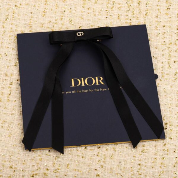 Forcina per capelli con lettera CD con fiocco Dior