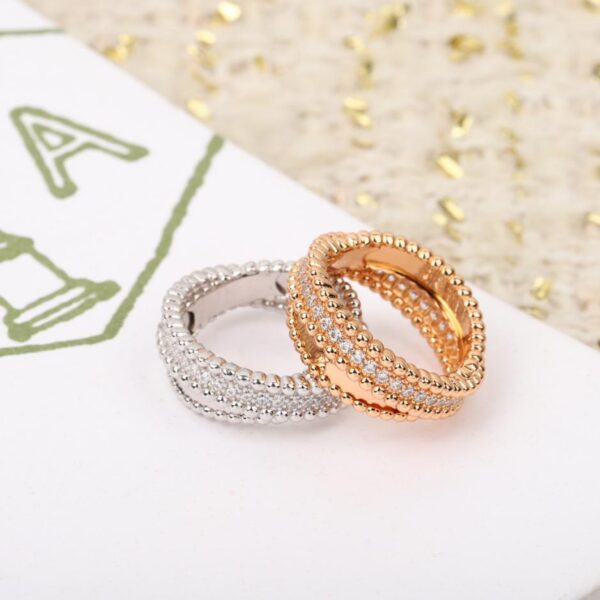 replica,repliche,fake,1:1,earrings,bracelet,ring,jewelry Van Cleef & Arpels Perlée diamanti duo戒指 