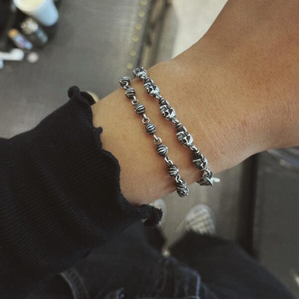 replica,repliche,fake,1:1,earrings,bracelet,ring,jewelry Bracciale soldato scheletro Foti con cuori cromati