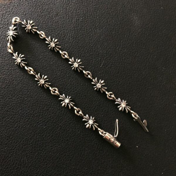 replica,repliche,fake,1:1,earrings,bracelet,ring,jewelry Bracciale in pietra fiore croce cuori cromati