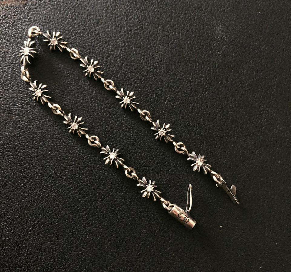 replica,repliche,fake,1:1,earrings,bracelet,ring,jewelry Bracciale in pietra fiore croce cuori cromati replica,repliche,fake,1:1,earrings,bracelet,ring,jewelry Bracciale in pietra fiore croce cuori cromati