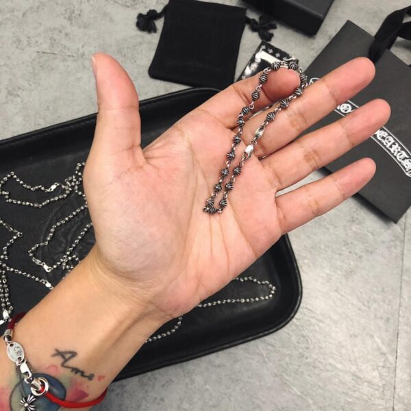 replica,repliche,fake,1:1,earrings,bracelet,ring,jewelry Bracciale/collana con sfere incrociate con trasferimento di perline cromate a forma di cuori