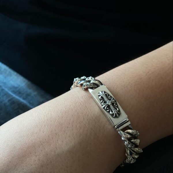 replica,repliche,fake,1:1,earrings,bracelet,ring,jewelry Bracciale in pietra mezzo fiore con croce e cuori cromati