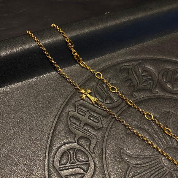 replica,repliche,fake,1:1,earrings,bracelet,ring,jewelry Collana con croce sottile placcata oro Chrome Hearts