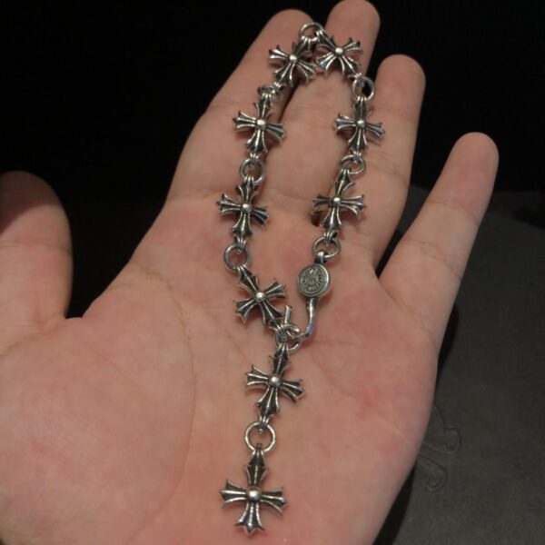 replica,repliche,fake,1:1,earrings,bracelet,ring,jewelry Bracciale con croce a nove sezioni con cuori cromati