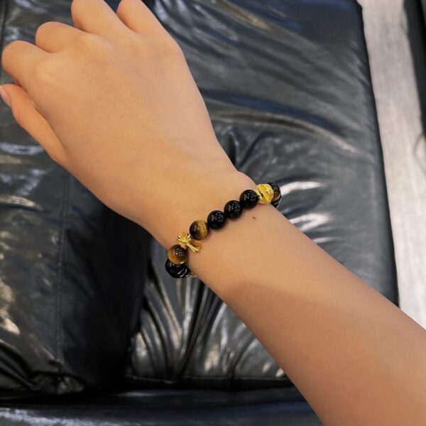 replica,repliche,fake,1:1,earrings,bracelet,ring,jewelry Bracciale in pietra ambrata con onice nero e croce di cuori cromati