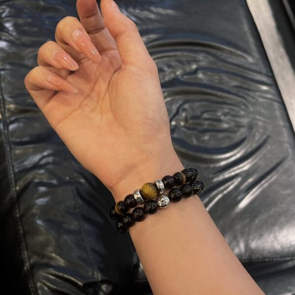 replica,repliche,fake,1:1,earrings,bracelet,ring,jewelry Bracciale in pietra d’ambra con cuori cromati