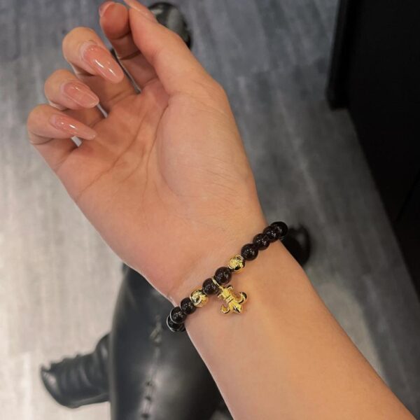 replica,repliche,fake,1:1,earrings,bracelet,ring,jewelry Bracciale floreale Scout con perline di cristallo e cuori cromati
