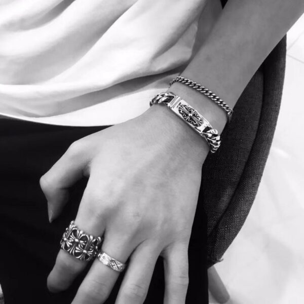 Bracciale con fiore a croce media con cuori cromati