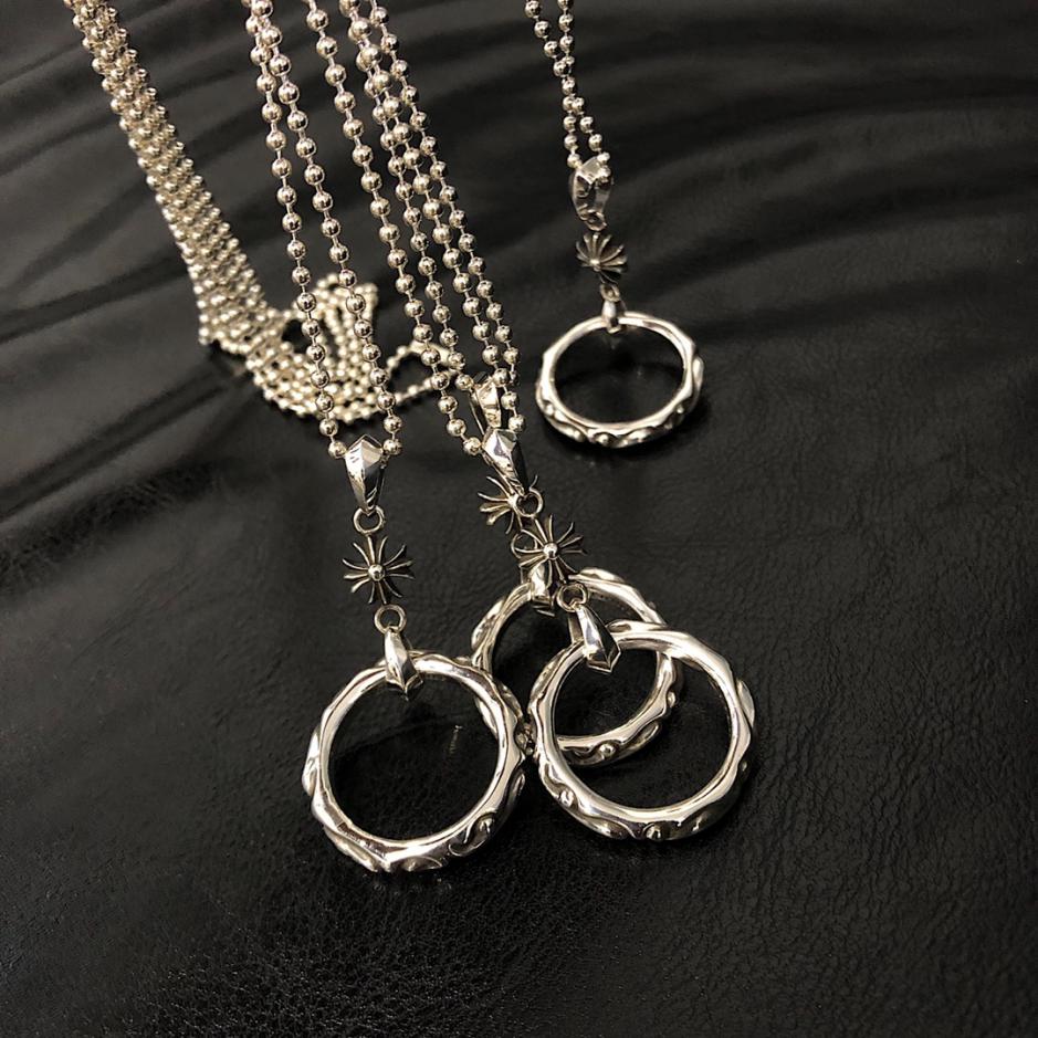 replica,repliche,fake,1:1,earrings,bracelet,ring,jewelry Collana con anello di vite e fiore incrociato con cuori cromati