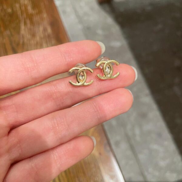 replica,repliche,fake,1:1,earrings,bracelet,ring,jewelry Orecchini doppia C Chanel di seconda mano (FEAE)