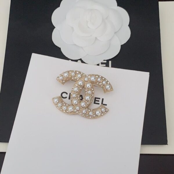 replica,repliche,fake,1:1,earrings,bracelet,ring,jewelry Spilla Chanel per il nuovo centenario (5FC0)