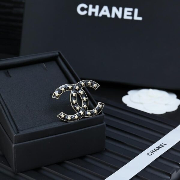 replica,repliche,fake,1:1,earrings,bracelet,ring,jewelry Spilla stella Chanel (F64D)