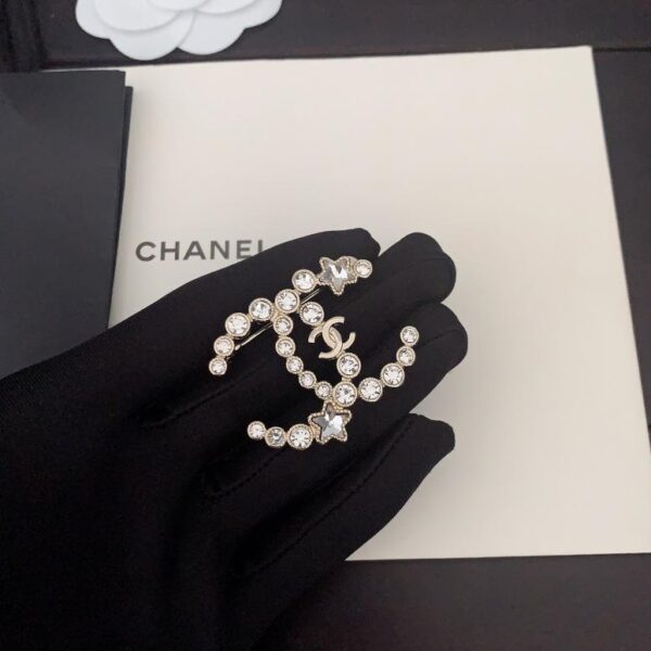 replica,repliche,fake,1:1,earrings,bracelet,ring,jewelry L’ultima spilla a stella a cinque punte in oro chiaro con diamanti rotondi di Chanel (FE36)