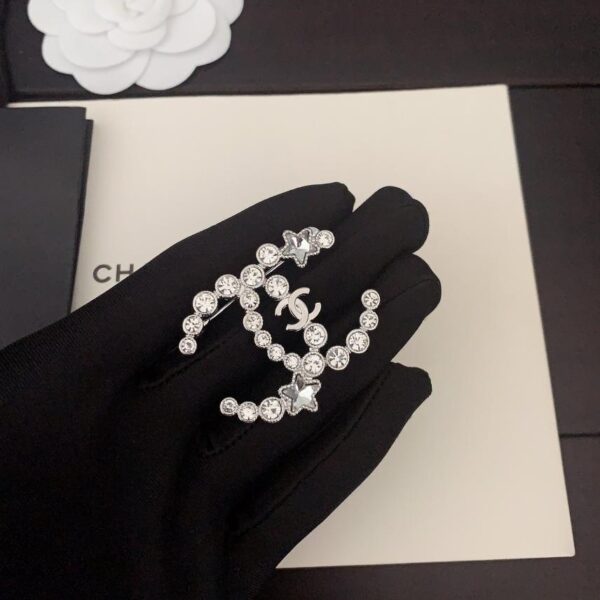 replica,repliche,fake,1:1,earrings,bracelet,ring,jewelry Ultima spilla Chanel con stella a cinque punte in oro bianco e diamanti rotondi (3D8C)