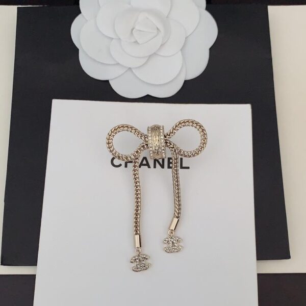 replica,repliche,fake,1:1,earrings,bracelet,ring,jewelry Ultima spilla con fiocco Chanel (03B3)