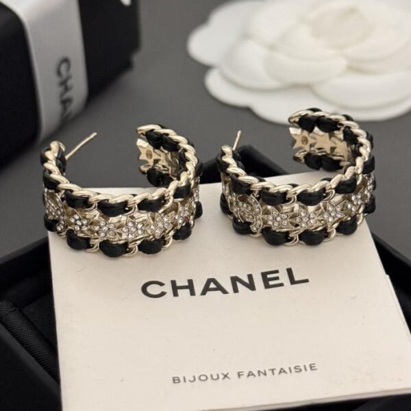 Orecchini Chanel stella in pelle nera (60BD)