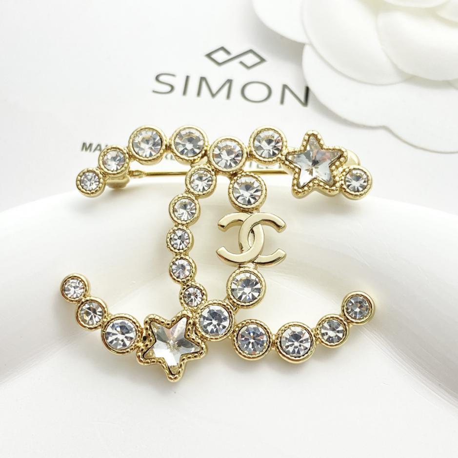 replica,repliche,fake,1:1,earrings,bracelet,ring,jewelry Spilla Chanel rotonda in cristallo con stella di diamanti in oro doppia C (111D) replica,repliche,fake,1:1,earrings,bracelet,ring,jewelry Spilla Chanel rotonda in cristallo con stella di diamanti in oro doppia C (111D)