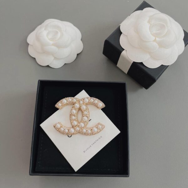 replica,repliche,fake,1:1,earrings,bracelet,ring,jewelry Spilla fisheye Chanel (1AC2)