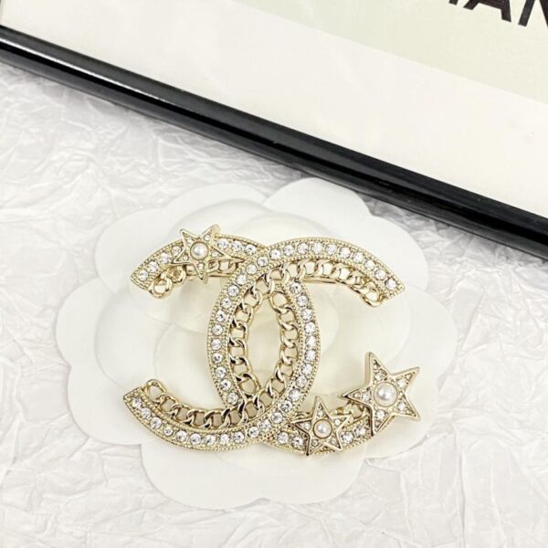 Spilla Chanel doppia C con strass stella (FF5C)