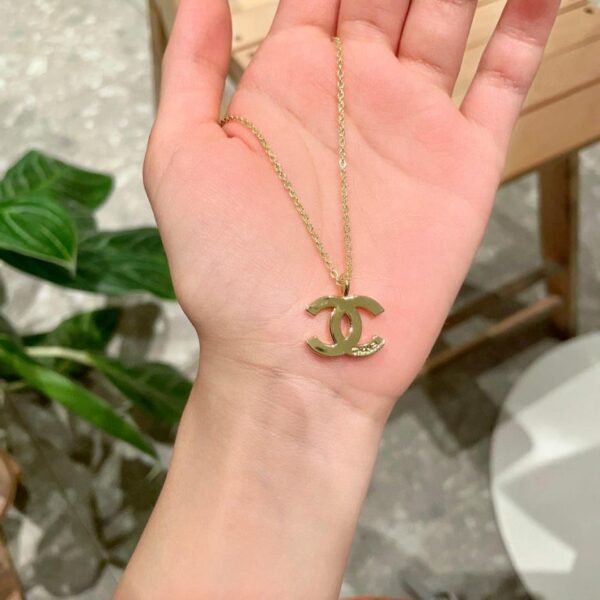 replica,repliche,fake,1:1,earrings,bracelet,ring,jewelry Collana Chanel con doppia lettera C (1886)
