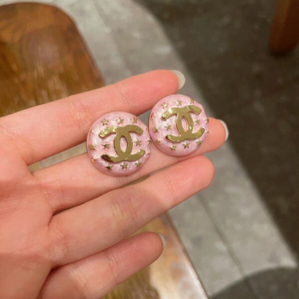 Orecchini a bottone Chanel Doppia C con stella (28A0)