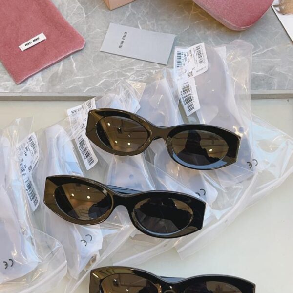 replica,repliche,fake,1:1,earrings,bracelet,ring,jewelry MIU MIU nuovi occhiali da sole ModSMU 11W